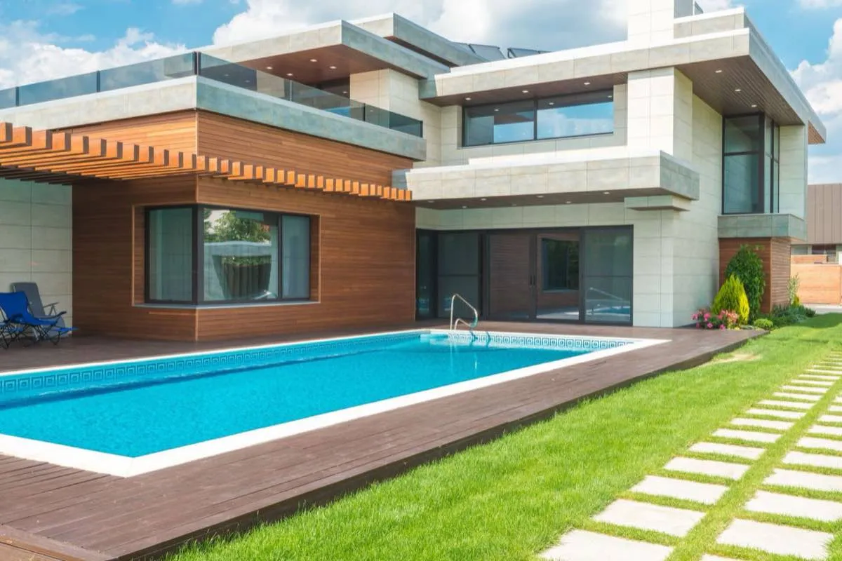 Backyard inground swimming pool with decking in Stockton, CA